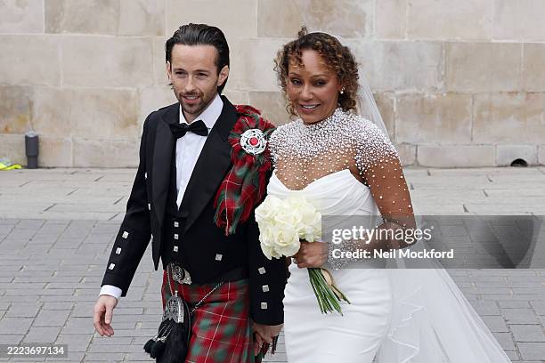 Newlyweds Rory McPhee and Mel B depart St Paul's Cathedral after their wedding on July 05, 2025 in London, England.