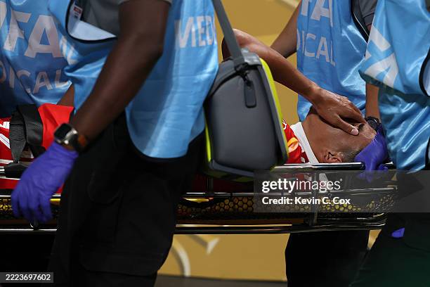 Jamal Musiala of FC Bayern Munchen reacts as he is carted from the pitch by medical staff following an injury during the FIFA Club World Cup 2025...
