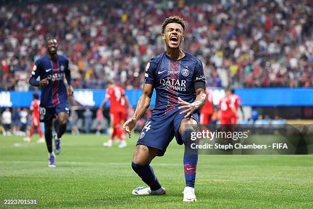Desire Doue of Paris Saint-Germain celebrates scoring his team's first goal during the FIFA Club World Cup 2025 quarter-final match between Paris...