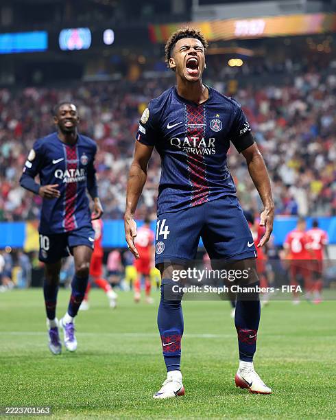 Desire Doue of Paris Saint-Germain celebrates scoring his team's first goal during the FIFA Club World Cup 2025 quarter-final match between Paris...