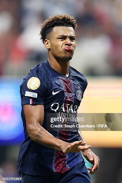 Desire Doue of Paris Saint-Germain celebrates scoring his team's first goal during the FIFA Club World Cup 2025 quarter-final match between Paris...