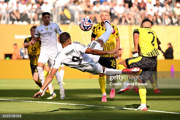 Kylian Mbappe of Real Madrid C.F. Scores his team's third goal past Gregor Kobel of Borussia Dortmund during the FIFA Club World Cup 2025...