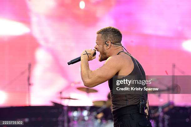 Dan Reynolds of Imagine Dragons performs live on stage at Stade de France on July 05, 2025 in Paris, France.