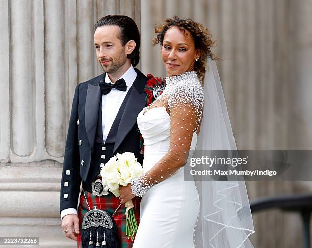 Rory McPhee and Mel B depart following their wedding in the OBE Chapel at St Paul's Cathedral on July 5, 2025 in London, England.