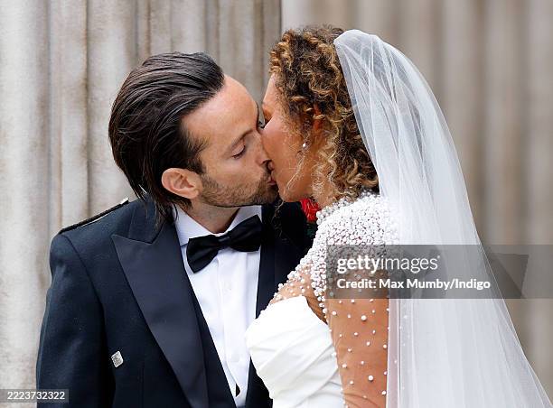 Rory McPhee and Mel B depart following their wedding in the OBE Chapel at St Paul's Cathedral on July 5, 2025 in London, England.