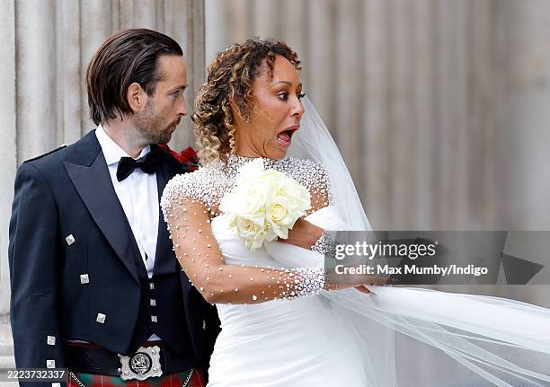 Rory McPhee and Mel B depart following their wedding in the OBE Chapel at St Paul's Cathedral on July 5, 2025 in London, England.