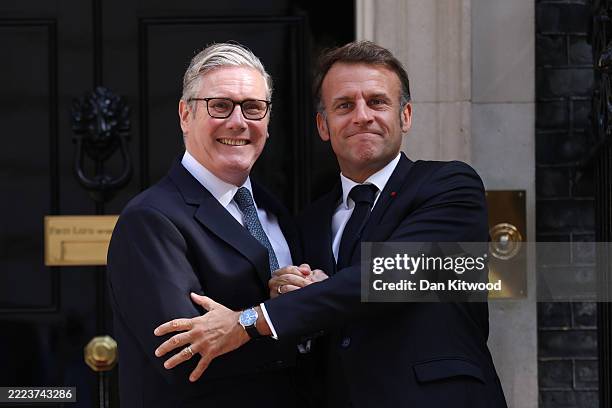 Prime Minister Keir Starmer greets President of France Emmanuel Macron at 10 Downing Street ahead of a France/UK Summit on July 10, 2025 in London,...