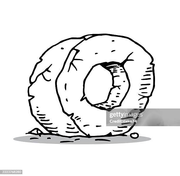 hand drawn stone wheel - stone stock illustrations