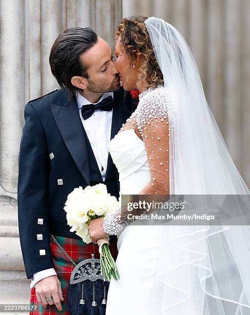 Rory McPhee and Mel B depart following their wedding in the OBE Chapel at St Paul's Cathedral on July 5, 2025 in London, England.