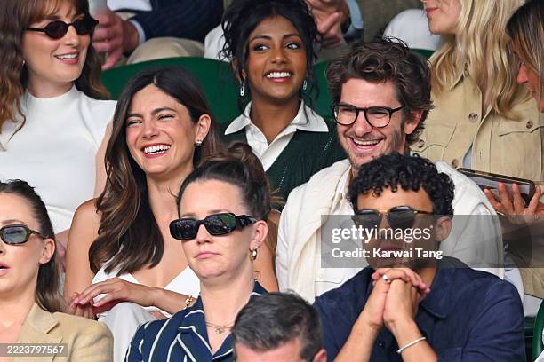 Monica Barbaro, Charithra Chandran, Andrew Garfield and Matthew Broome, wearing Ralph Lauren, attend day seven of the Wimbledon Tennis Championships...