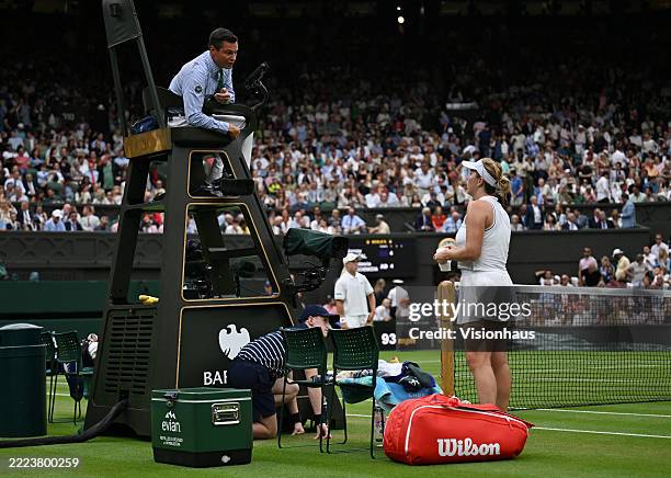 Anastasia Pavlyuchenkova speaks to the match umpire as the hawk eye line calling system is checked for a fault during the Ladies' Singles fourth...