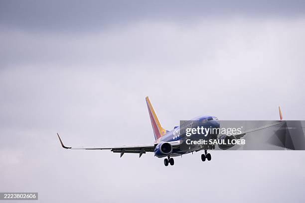 Southwest Airlines Boeing 737-700 airplane prepares to land at Ronald Reagan Washington National Airport in Arlington, Virginia, on July 10, 2025.