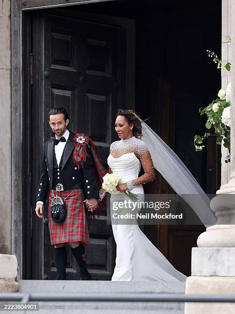 Newlyweds, Mel B and Rory McPhee depart St Paul's Cathedral as husband and wifeon July 05, 2025 in London, England.