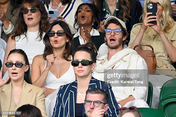 Erin Doherty, Julia Manstead, Monica Barbaro, Charithra Chandran and Andrew Garfield, wearing Ralph Lauren, attend day seven of the Wimbledon Tennis...