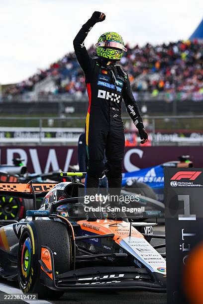 Race winner Lando Norris of Great Britain and McLaren celebrates on arrival in parc ferme during the F1 Grand Prix of Great Britain at Silverstone...