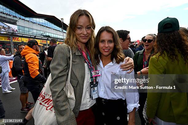Olivia Wilde and Felicity Jones on the grid during the F1 Grand Prix of Great Britain at Silverstone Circuit on July 06, 2025 in Northampton, England.