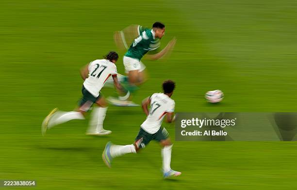 Vitor Roque of Palmeiras runs with the ball while under pressure from Malo Gusto of Chelsea FCduring the FIFA Club World Cup 2025 quarter final match...