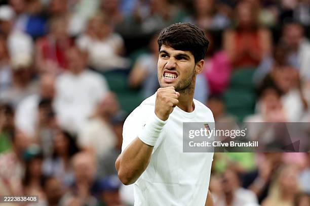 Carlos Alcaraz of Spain celebrates a point against Andrey Rublev during the Gentlemen's Singles fourth round match on day seven of The Championships...