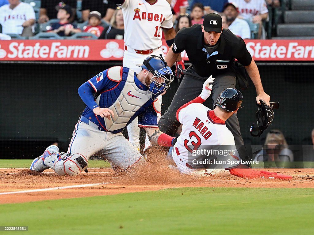 Texas Ranger Heim Texas Rangers catcher Jonah Heim tags Los Angeles Angels left fielder ...