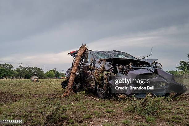 Damaged vehicle sits on the banks of the Guadalupe River on July 06, 2025 in Kerrville, Texas. Heavy rainfall caused severe flooding along the...
