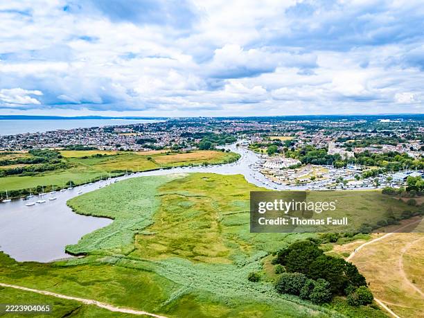 river stour and stanpit with bournemouth coast - bournemouth uk stock pictures, royalty-free photos & images