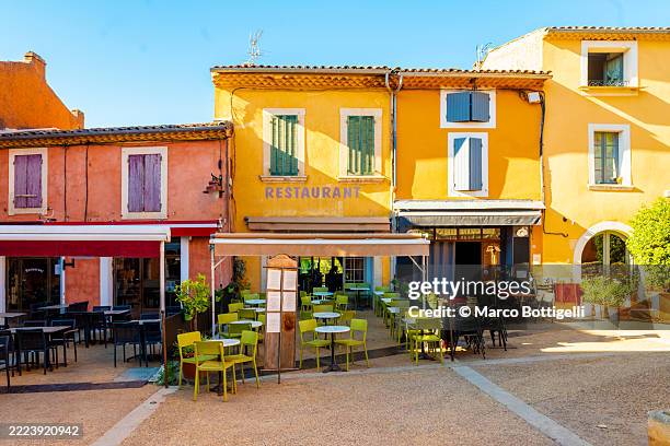 charming village restaurant in colorful roussillon, france - charming stock pictures, royalty-free photos & images