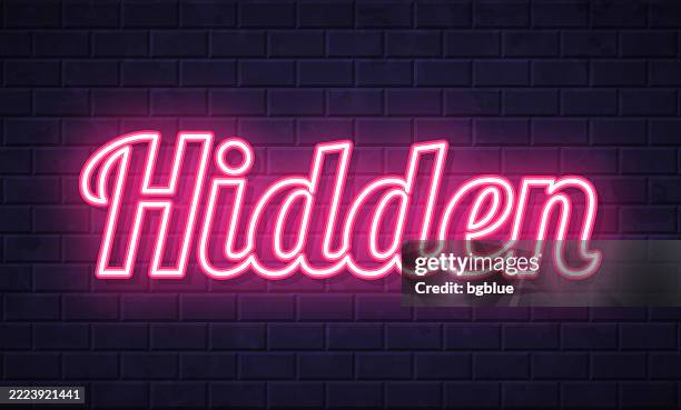 hidden - glowing neon text on brick wall background - hide behind wall stock illustrations