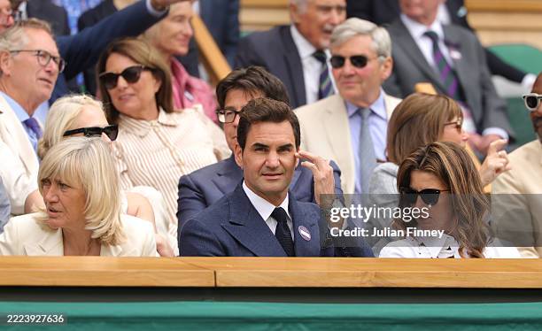 Former tennis player, Roger Federer, looks on in the Royal Box prior to the Gentlemen's Singles fourth round match between Alex De Minaur of...