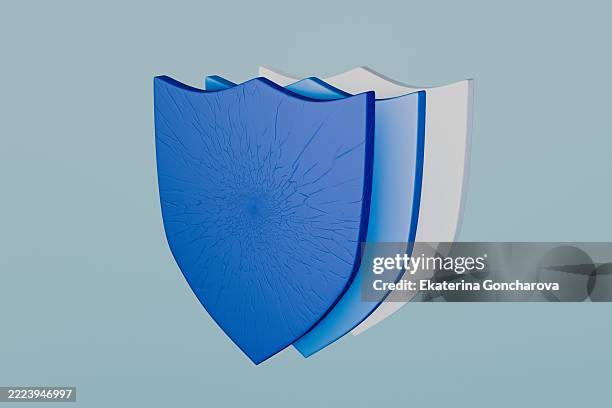 layered blue and white shield symbolizing protection and security - realismo-concettuale foto e immagini stock