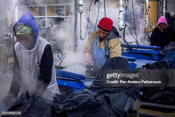 Factory workers employed by Afri-Expo iron denim products on July 4, 2025 in Maseru, Lesotho. The company exports most of its products to South...