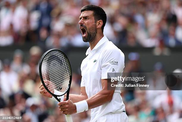 Novak Djokovic of Serbia celebrates winning the second set against Alex De Minaur of Australia following the Gentlemen's Singles fourth round match...