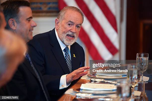 Ambassador to Israel Mike Huckabee delivers remarks as President Donald Trump hosts Israeli Prime Minister Benjamin Netanyahu for a dinner in the...