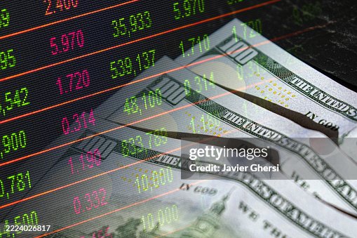 Digital Market Data Overlaid on US Dollar Banknotes Digital Market Data Overlaid on US Dollar Banknotes
