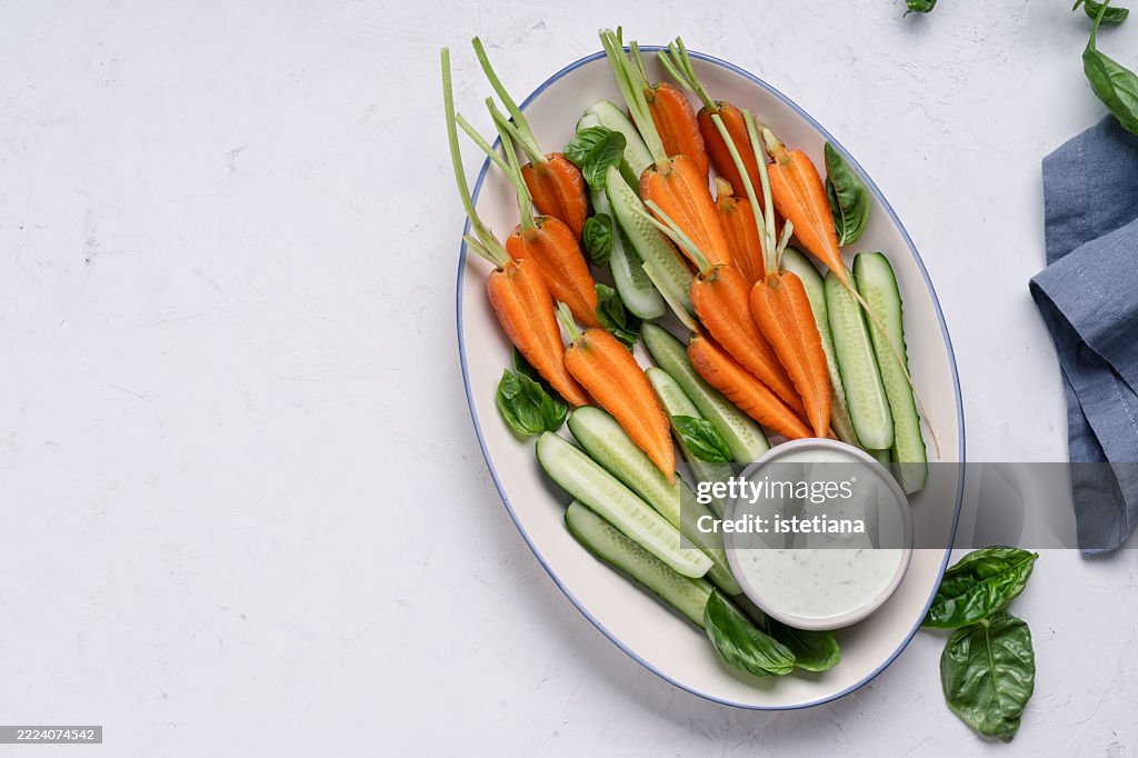 Fresh vegetables with buttermilk ranch salad dressing dip, copy space