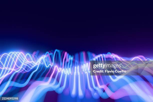 a dynamic visualization of digital energy and abstract data flow - radio wave stock pictures, royalty-free photos & images