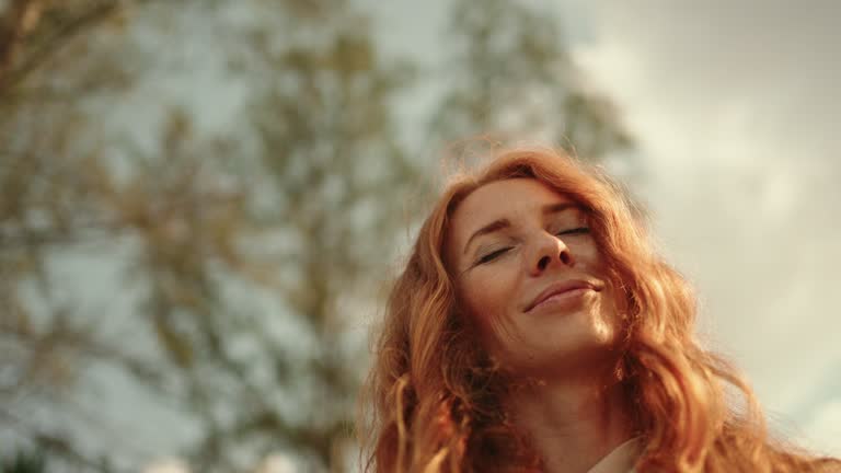 https://media.gettyimages.com/id/2224108400/video/beautiful-woman-in-harmony-with-nature-eyes-closed-in-sunlight.jpg?b=1&s=640x640&k=20&c=IHAL9hTK7-6y0SyKgCvBuijCjkC5qtuFOrcLGiUxrRY=