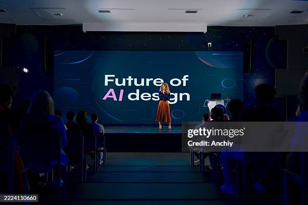 speaker discussing advancements in ai design at a technology conference - local religioso imagens e fotografias de stock