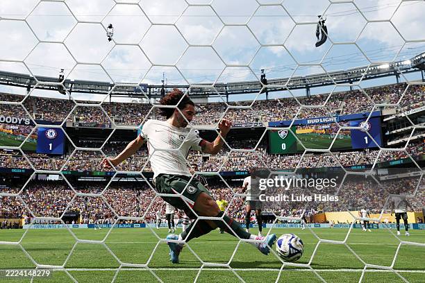Marc Cucurella of Chelsea FC saves an attempt on goal during the FIFA Club World Cup 2025 semi-final match between Fluminense FC and Chelsea FC at...