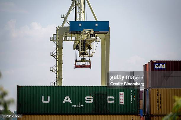 Gantry crane and shipping containers at the Port of Montreal in Montreal, Quebec, Canada, on Saturday, July 12, 2025. US President Donald Trump...