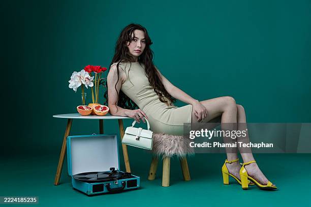 stylish woman in modern look posing with summer props and accessories - attitude stock pictures, royalty-free photos & images