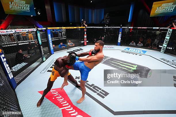 Roybert Echeverria knees Tumelo Manyamala in their flyweight fight during the filming of The Ultimate Fighter Season 33 at UFC APEX on February 26,...