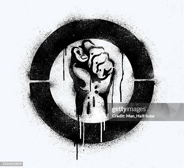 raised fist stencil graffiti - revolutionary war stock illustrations