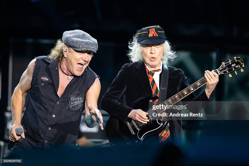Singer Brian Johnson and musician Angus Young of AC/DC perform... News ...