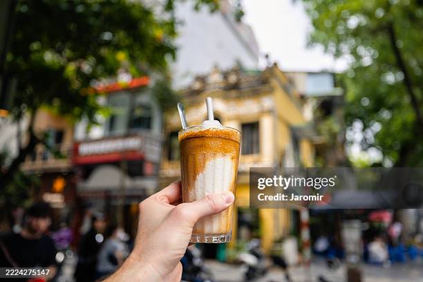 refreshing iced vietnamese coconut coffee in hanoi - vietnamese culture stock pictures, royalty-free photos & images
