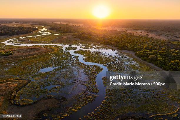 high angle view of land against sky during sunset,botswana - botsuana imagens e fotografias de stock