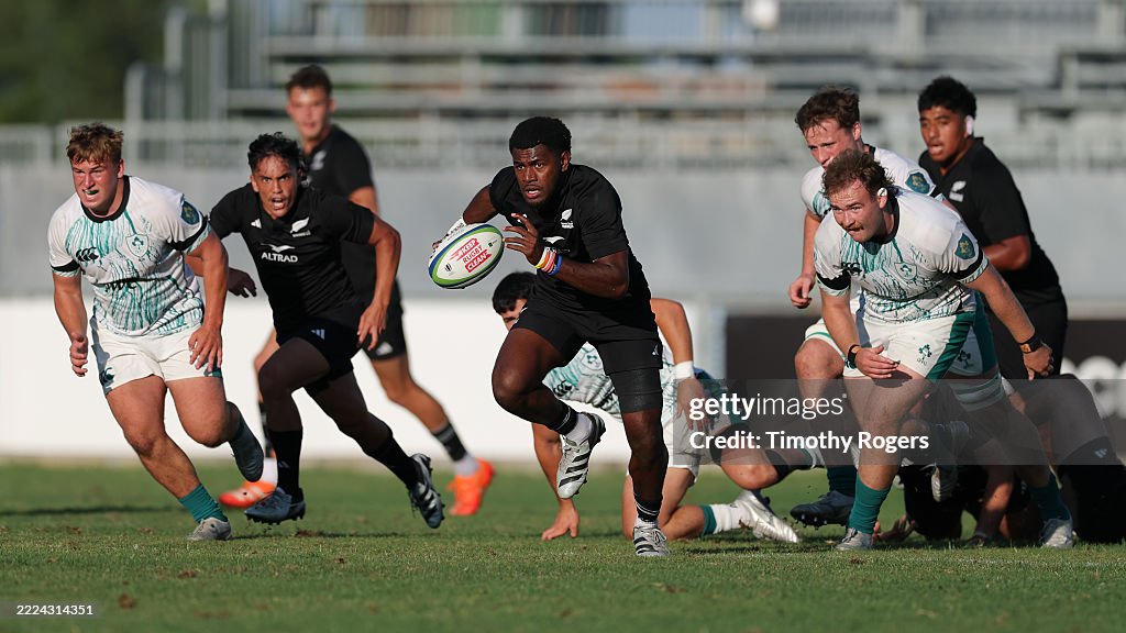 Jason Maloni Rugby Maloni Kunawave of New Zealand sets off on a run up field before ...