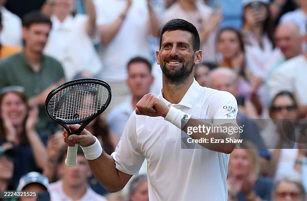 Novak Djokovic of Serbia celebrates winning match point Flavio Cobolli of Italy during the Gentlemen's Singles quarter-final match on day ten of The...