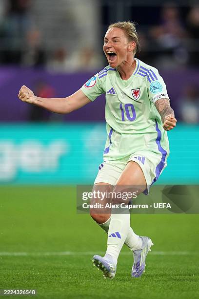 Jess Fishlock of Wales celebrates scoring her team's first goal after the VAR reviewed the on-field decision to disallow the goal before overturning...