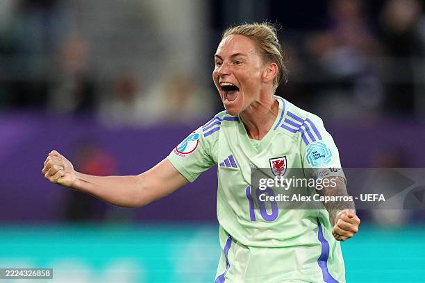 Jess Fishlock of Wales celebrates scoring her team's first goal after the VAR reviewed the on-field decision to disallow the goal before overturning...