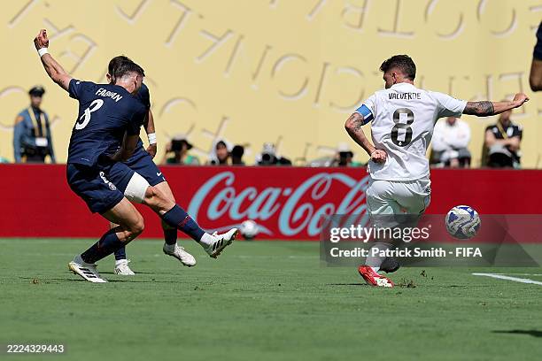 Fabian Ruiz of Paris Saint-Germain scores his team's third goal past Federico Valverde of Real Madrid C.F. During the FIFA Club World Cup 2025...